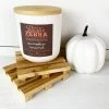 12 Oz Pumpkin Caramel Candle In A White Tumbler Jar With Bamboo Lid